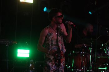 Dub Catalyst's Rudy spittin out the lyrics at Beautiful days Festival 26 | The Source Studio

