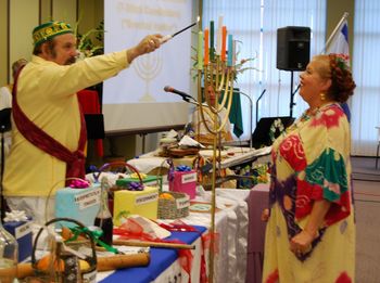 Feast Of Pentecost Shavuot lighting Menorah
