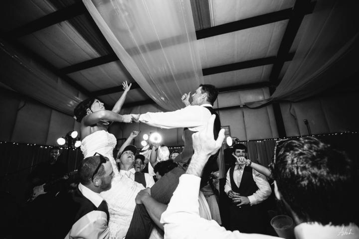 Bride and groom lifted on chairs by guests as 7 Sharp 9 plays