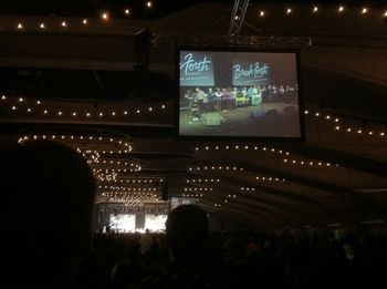 All the people on the screen are from Wales. Their goal is to go home and start a Break Forth in their country. Also on the stage are 2 men from Finland who started their own Break Forth 5 years ago, and now get 5000 attendees.

