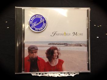 The new look of our Infinitely More CD, featuring our snazzy The Word Awards Finalist stickers!
