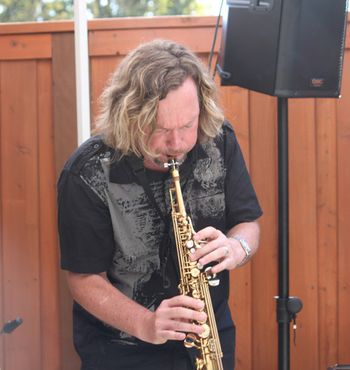 Ray blowing on some soprano sax.
