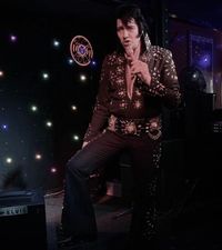 James Burrell as Elvis