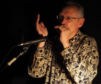 Chard Chenier: harmonica in Planet on Fire, Cry Baby Cry. Photo: bc

