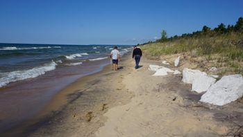 Glenn and Greg looking for whatever you look for walking a beach!
