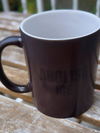 “ABOLISH ICE” heat-reactive mug