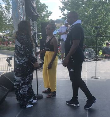 Sheri Hauck going over the stage mix with Recording Artist Tamia during soundcheck.
