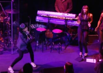 Sheri Hauck performing behind recording artist Brandy on her 2009 Japan/European tour.
