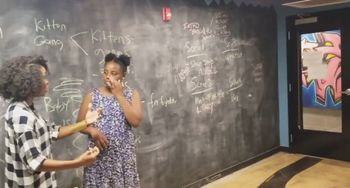 Sheri Hauck teaching a young vocalist about 'feeling' a song at the Commercial Music Conference.
