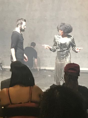 Sheri Hauck and Music Video Director Jeremy Ryan on set discussing stage blocking for the artists.
