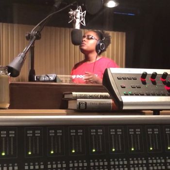 Vocal student Kyiara receiving direction by Sheri Hauck in a recording session.
