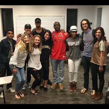 Sheri Hauck pictured alongside Craig A. King and students after speaking at Blair School of Music.

