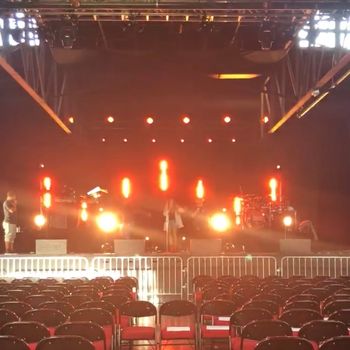 Sheri Hauck directing stage blocking with recording artist Tamia during soundcheck for the 'Passion Like Fire Tour'.
