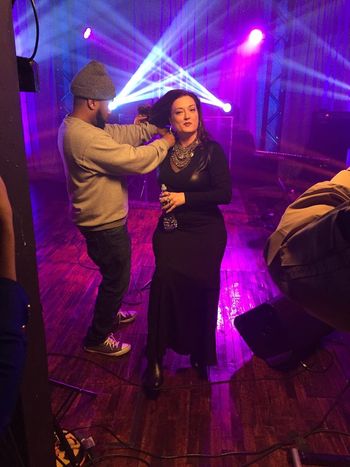 Greenspan getting Janice B. Mic-ed up
