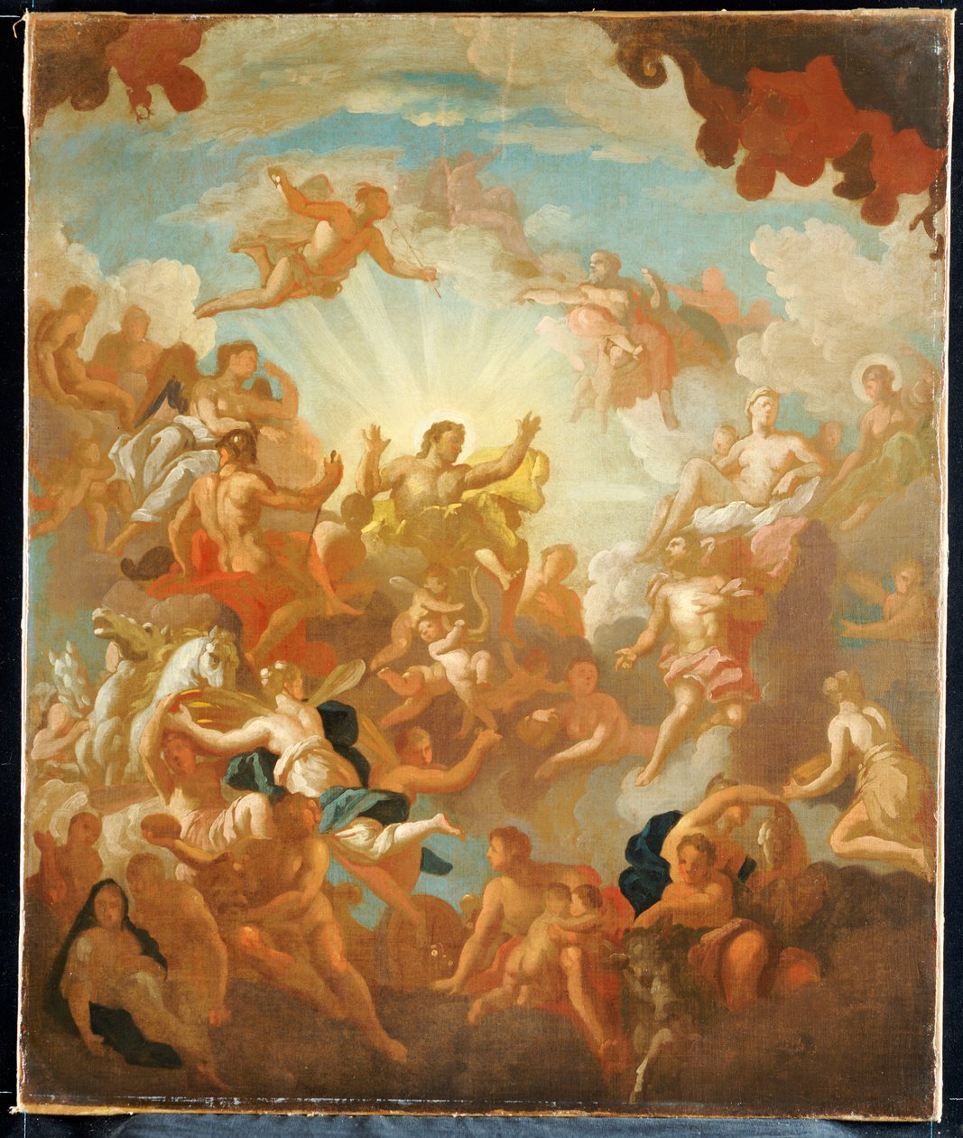 A baroque painting depicting massed semi-naked figures of Greek gods and goddesses floating in a sky surrounded by clouds, with a central figure, Zeus, raising his hands to stop a man, Prometheus, from escaping with a bundle of lit logs