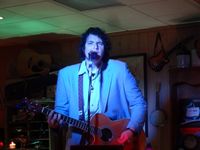 bd Mooney on bass guitar for Travis Bowlin