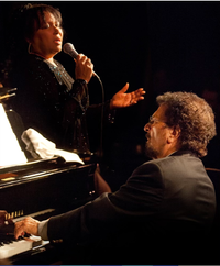 Shawnn Monteiro singing a tribute to Mike Renzi