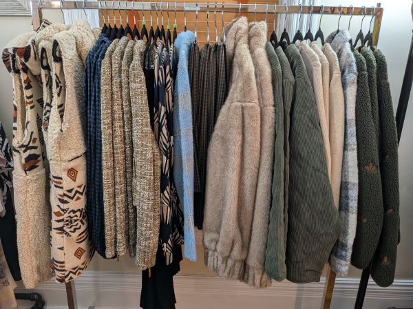 Fall clothes hanging on a rack