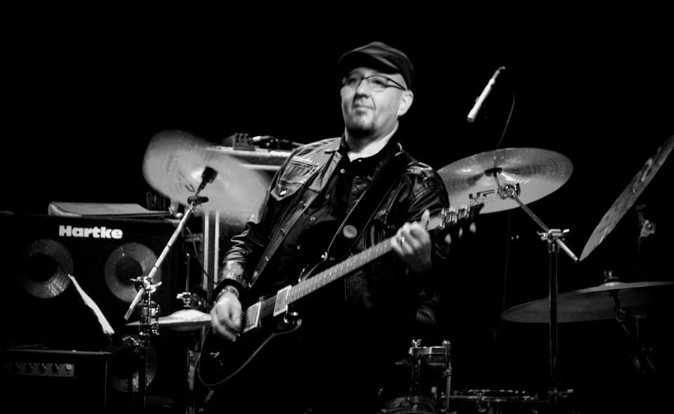 John Ashton: Producer, Lead Guitar, Writer
