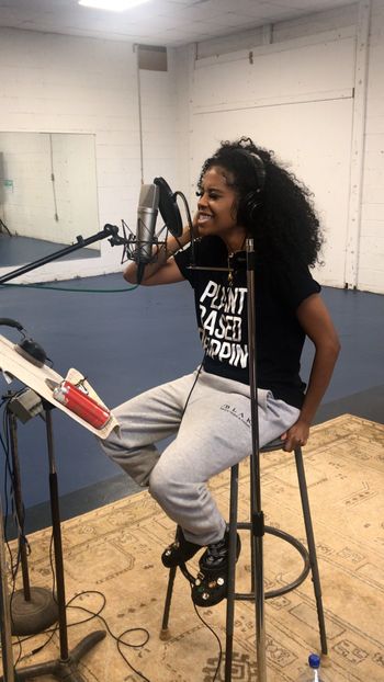 Kendria singing in the studio on Scott Hall's track
