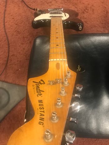 Fender Mustang guitar leaning against amplifier in the studio for Scott Hall musician and songwriter session
