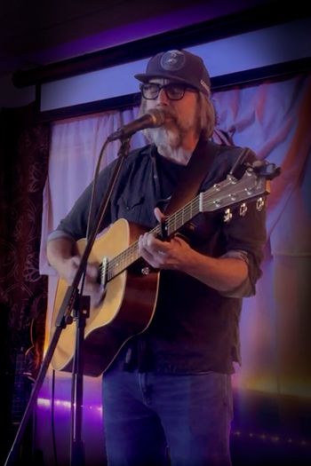 Scott Hall musician and songwriter singing and playing a Martin HD-28 acoustic guitar live
