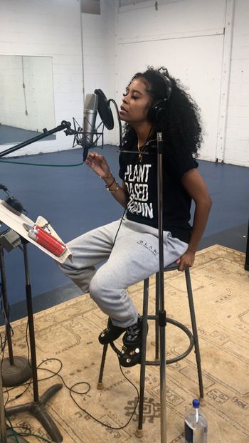 Kendria singing in the studio on Scott Hall's track
