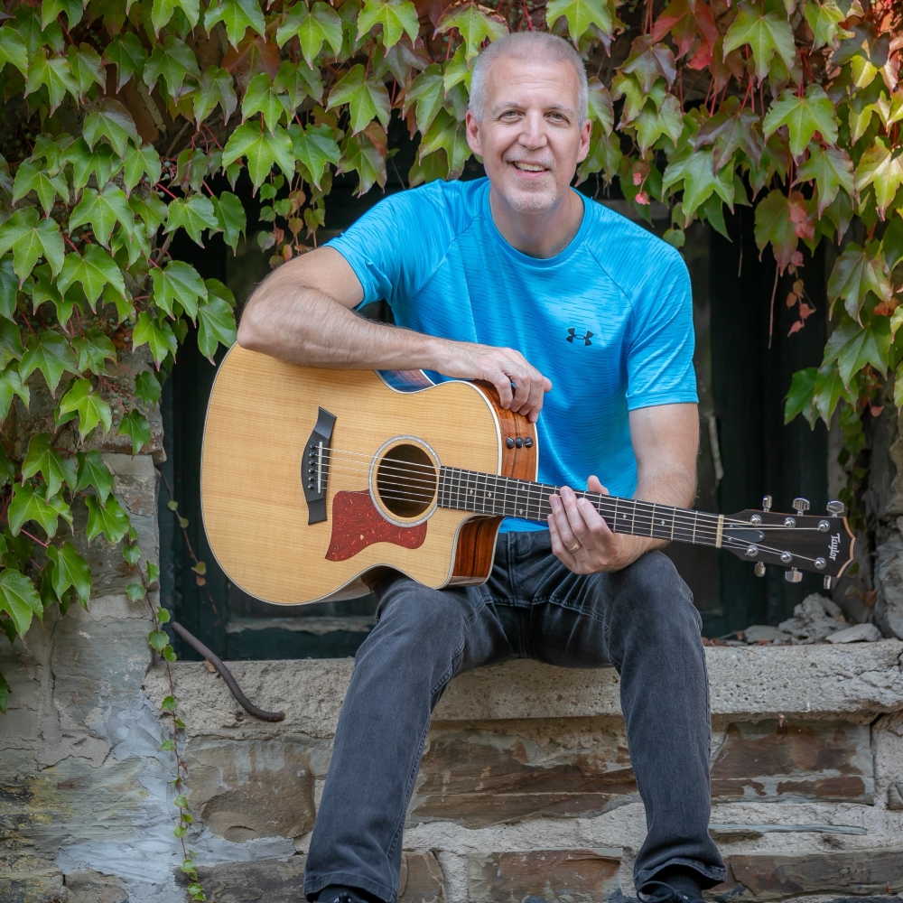 Mike Lucey on a Stone Ledge