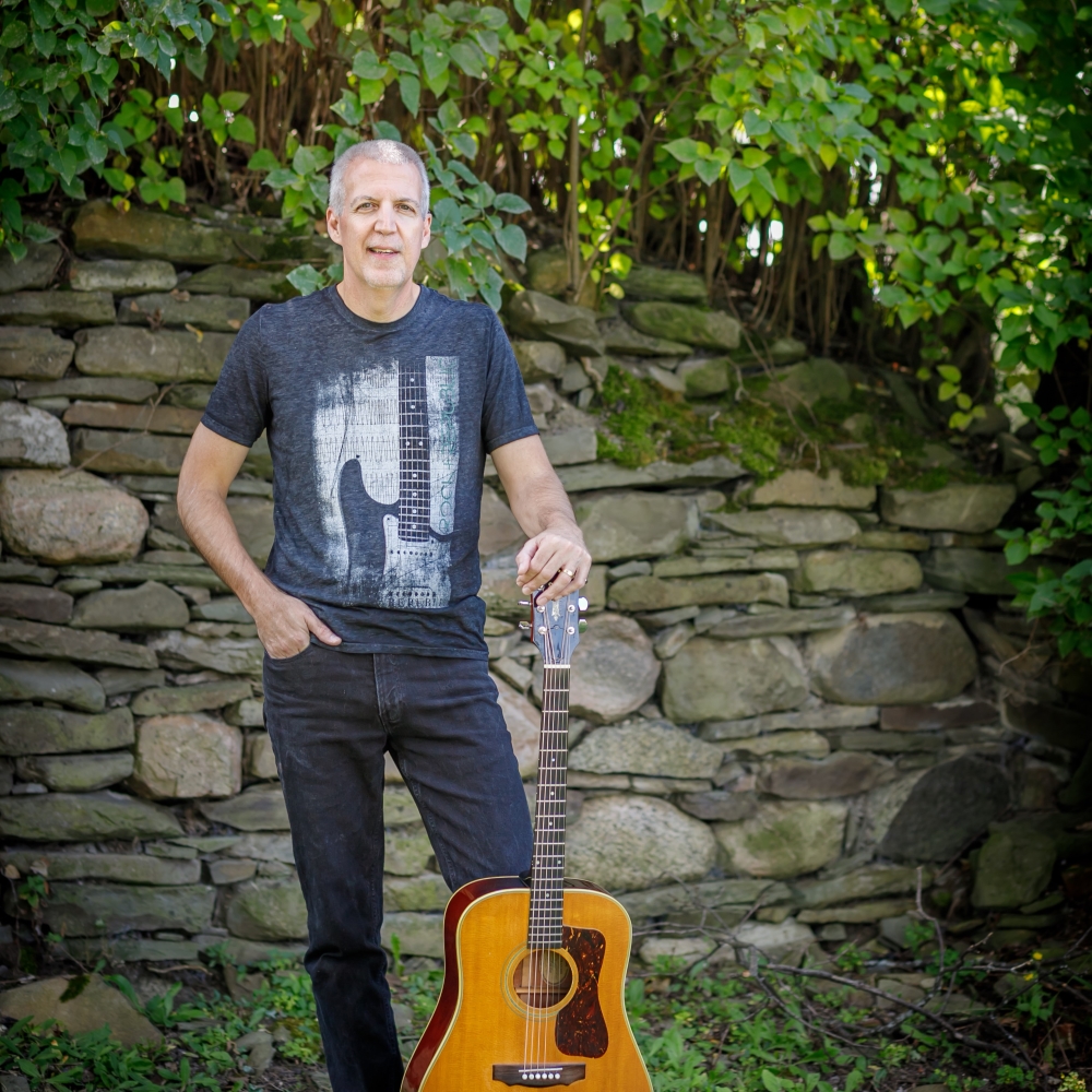 Mike Lucey at Stone Wall w Guitar