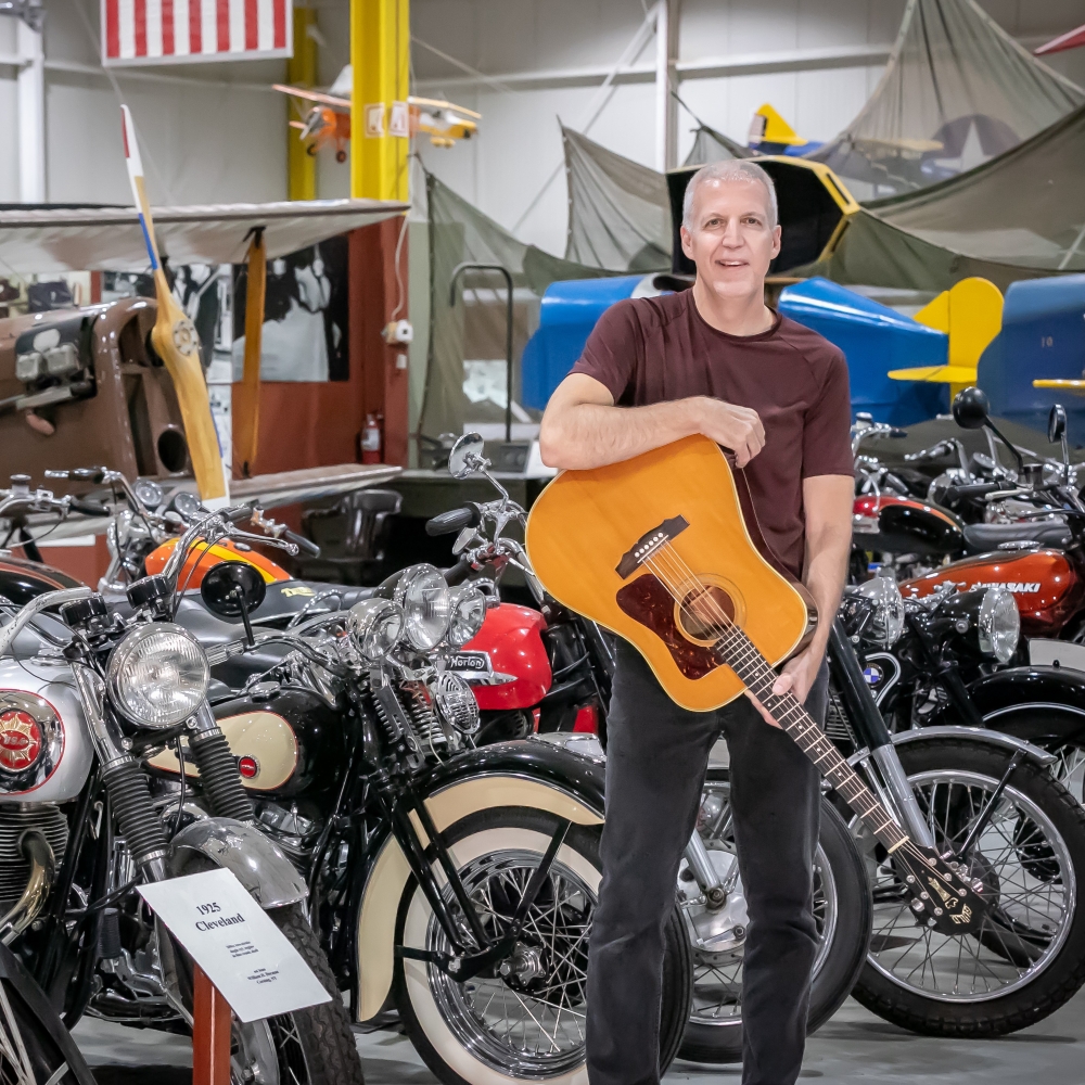 Mike Lucey with Guitar at Bike Museum