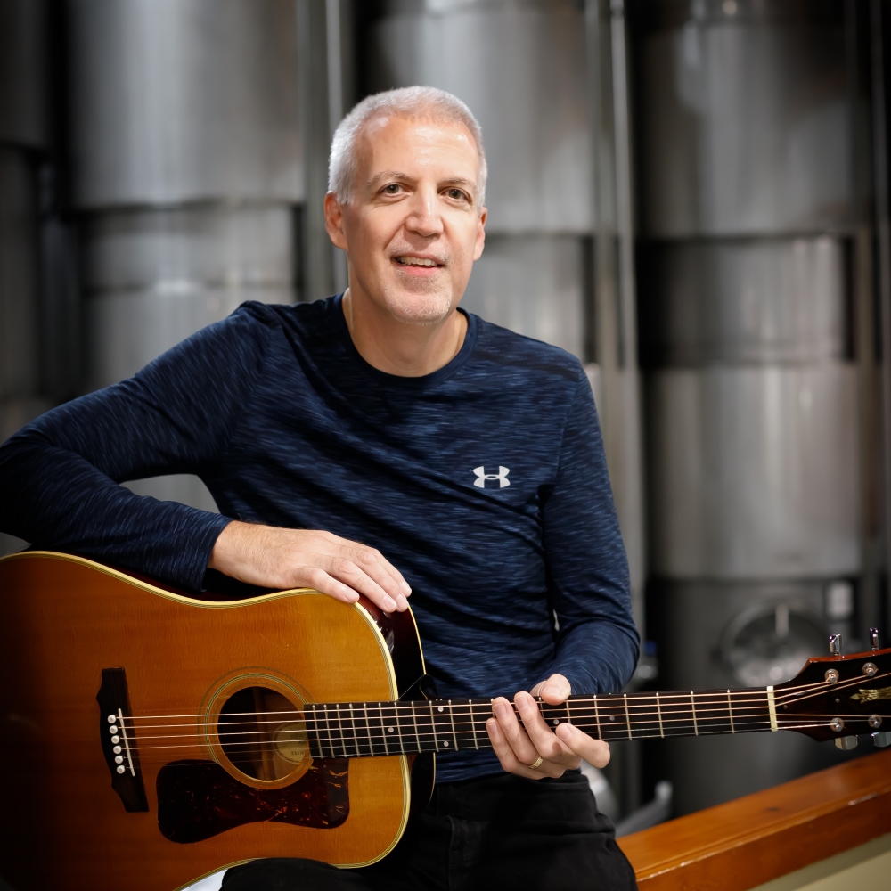 Mike Lucey in Front of Stainless Barrels