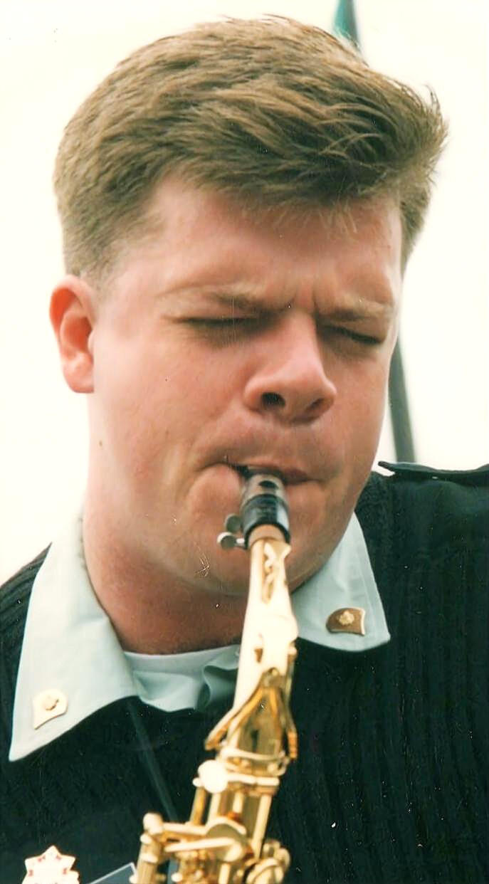 Brian Grace taking an alto sax solo at Fisherman's Wharf, San Francisco, 1994