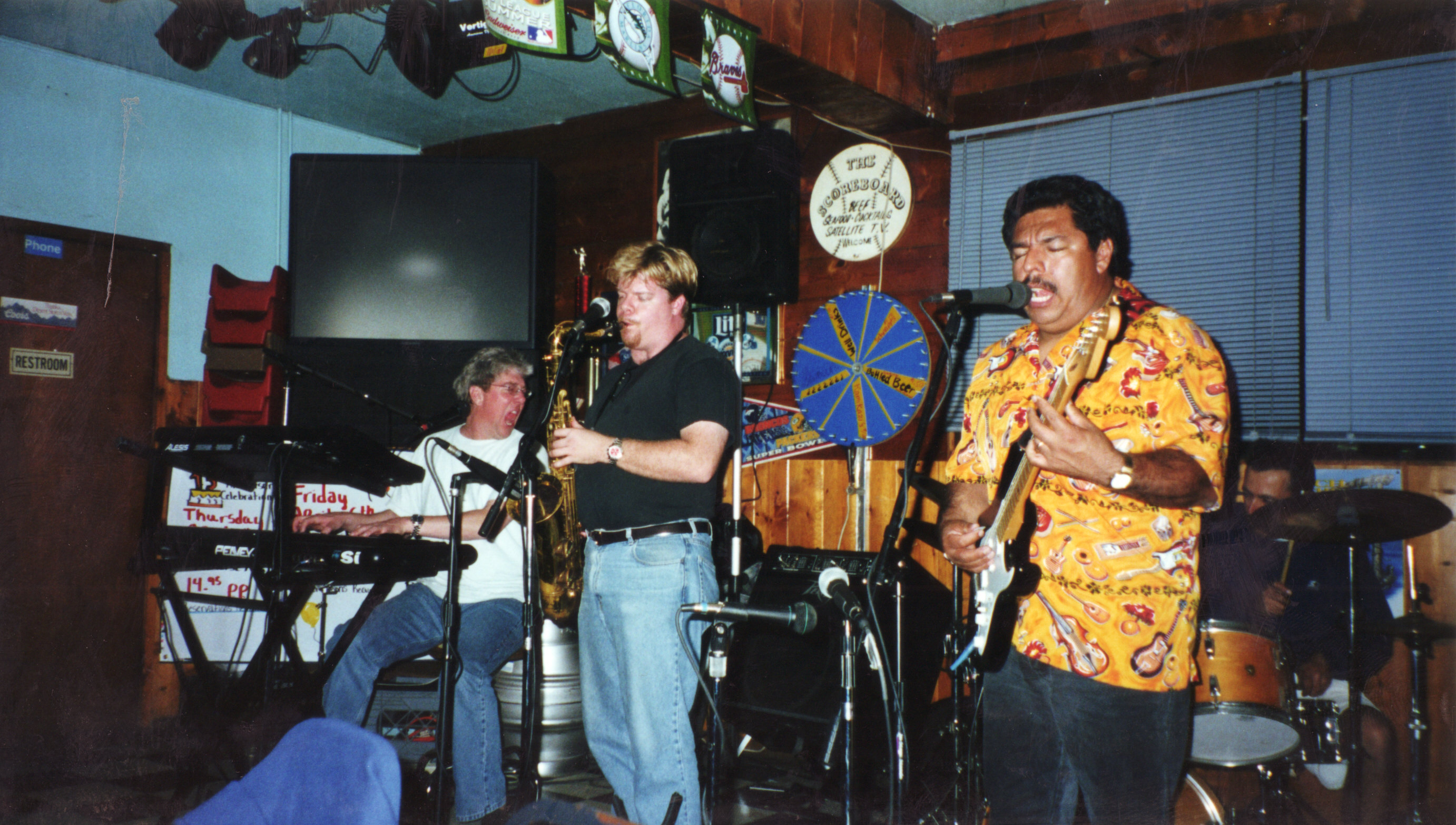Keyboard player Bob Adams yelling at drummer Artie, Scoreboards, Imperial Beach, April 2001