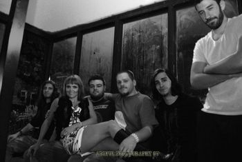 On the way to perform at Dingbatz "Random Model" walking by takes picture with headlining band Waking Alley.  awesome impromptu picture.  June 2010.
