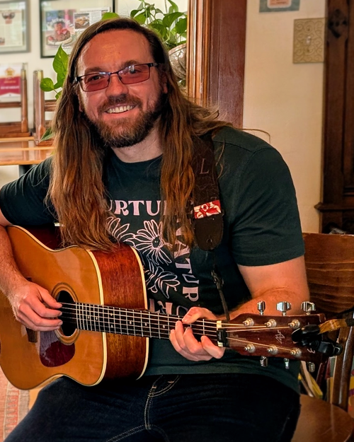 Mike Leavitt teaching guitar lessons in Salt Lake City