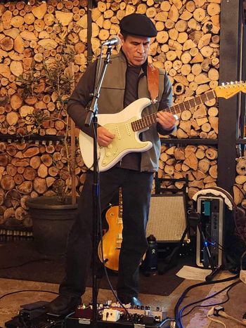 Ed laying down a serious guitar solo at Capelos 2/17/2024
