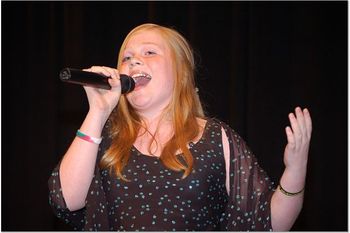 11 year old Eva McVey belting out "His Life For Mine".
