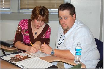 Belinda Stutzman and Chad Riley are hard at work in Shawn's class.
