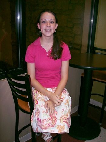 Katherine sitting on her throne in the Hub.
