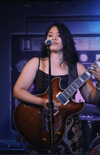 Kelli of RAMEKEGA at Hotel Ziggy performing for the We Found New Music Showcase. © 2024 RAMEKEGA/WSP Music Group. All Rights Reserved.
