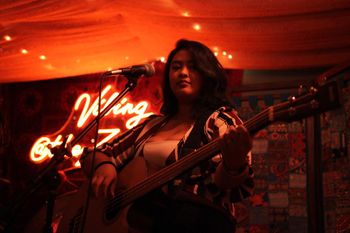 RAMEKEGA at Zula Den performing for the Songs & Stories Showcase. Photo Credit: Betty Ji. © 2025 RAMEKEGA/WSP Music Group. All Rights Reserved.
