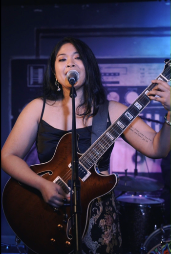 Kelli of RAMEKEGA at Hotel Ziggy performing for the We Found New Music Showcase. © 2024 RAMEKEGA/WSP Music Group. All Rights Reserved.
