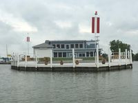 Public Scene by the boats and waters edge