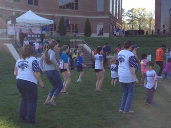 Everyone doing a little line dancing.
