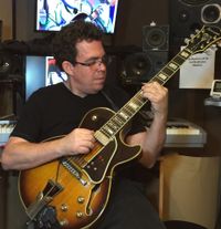 Guitarist David Snow Plays the Normandy Bakery