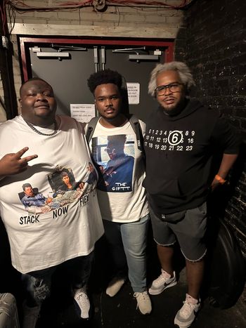The Giftt poses with greatness, Christone King fish Ingram and his manager, Rick
