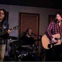 Dan Israel plays Dylan songs with Dean Wolfson and Tommy Bentz and others at Tuttle's in Hopkins