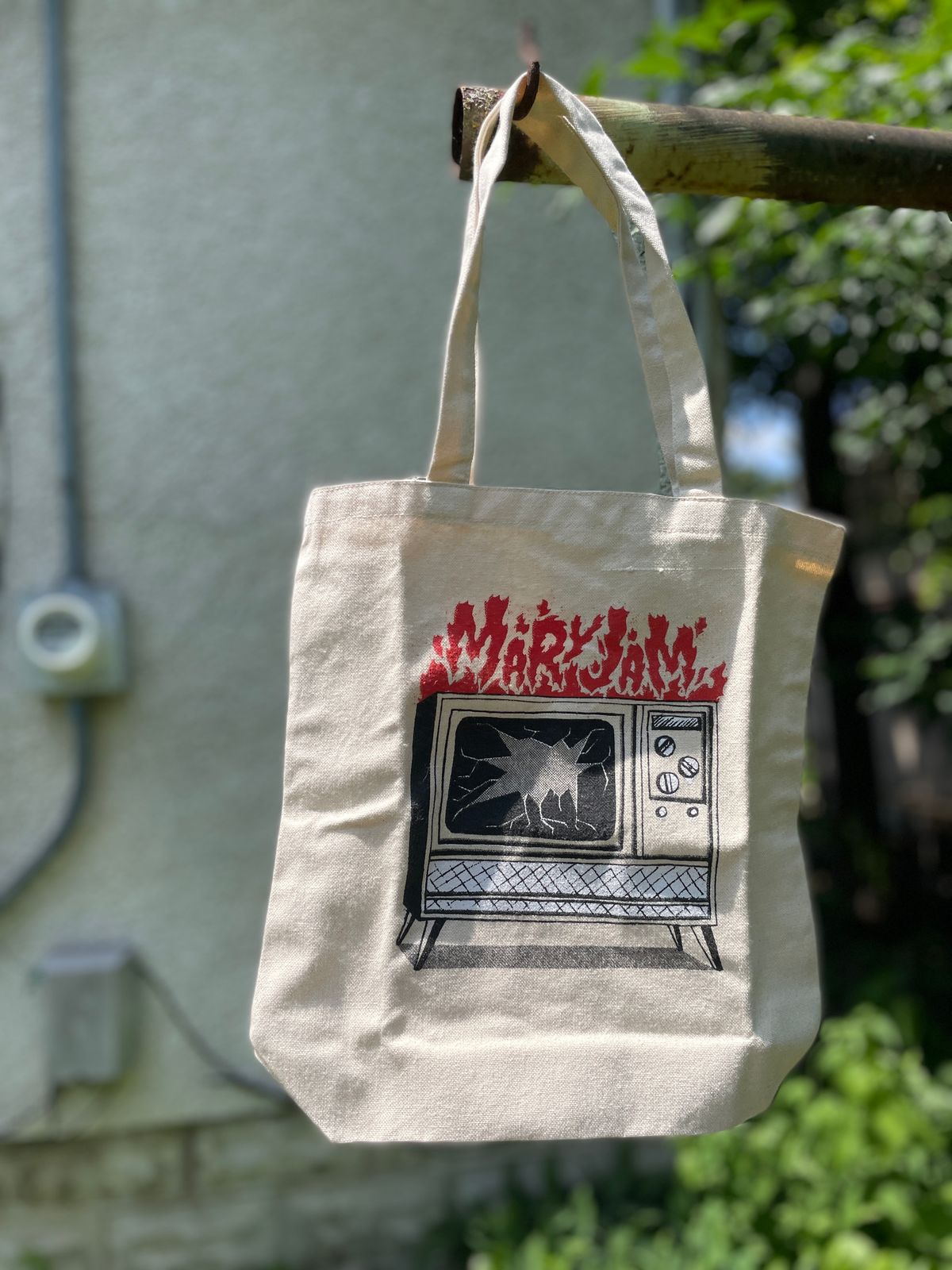 BURNING TV TOTE