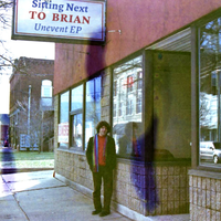 Unevent E.P. by Sitting Next To Brian