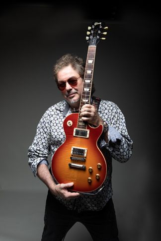John Albino: Songwriter, Vocalist, Guitars
